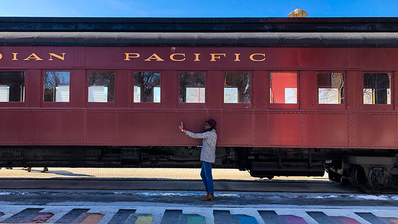 woman-taking-selfie-phone-photo-railcars-the-forks-sidewalk-mural.jpg (347 KB)